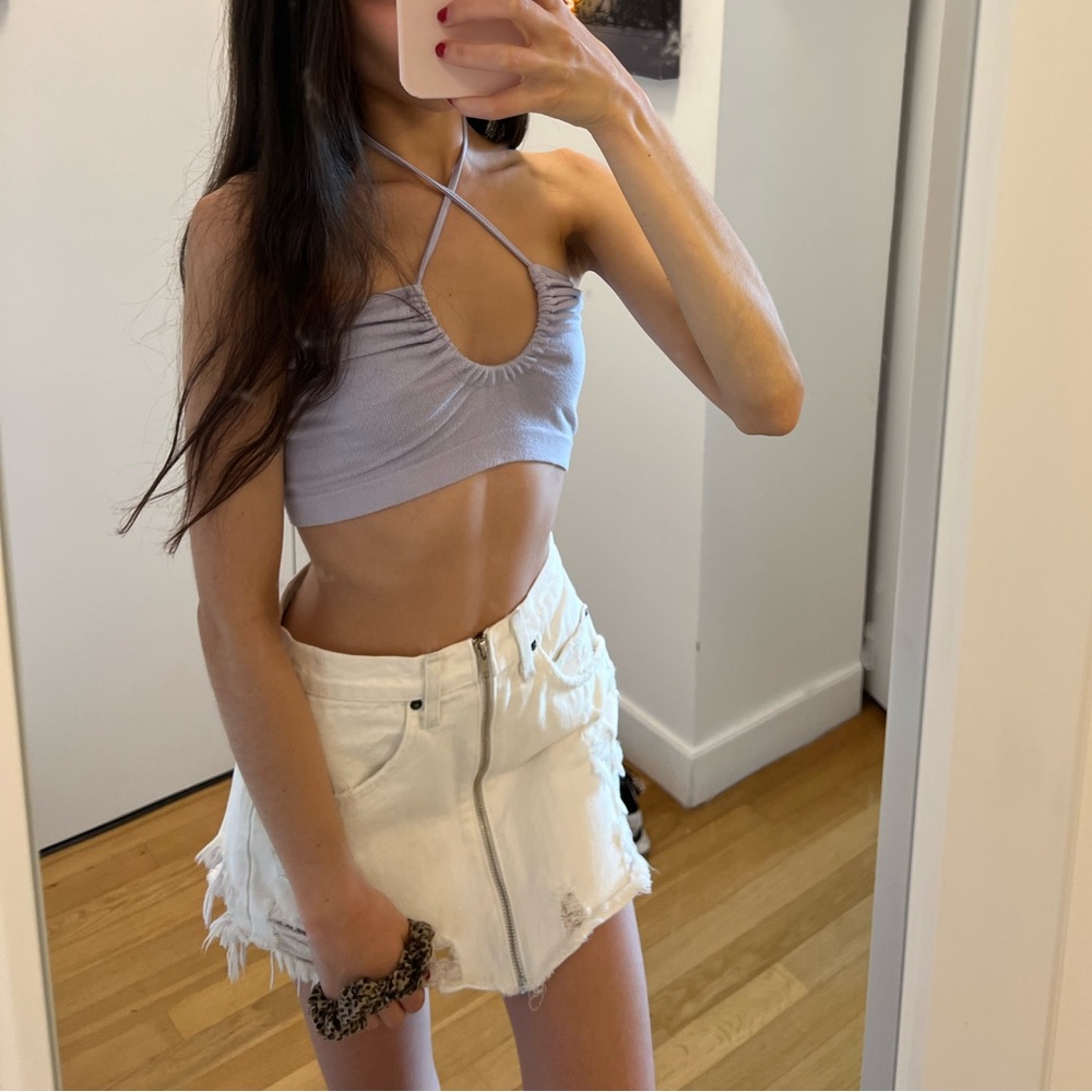 Urban outfitters crop top can be worn either of the 2 ways shown in the photos!